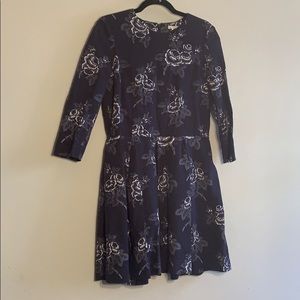 Blue pleated dress with roses